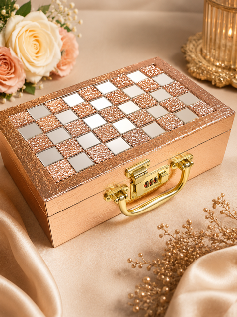 Elegant rose-gold bangle box with mirror detailing, soft velvet interior, secure lock, and spacious bangle holders. Approx. Size: 30 × 17× 9 Cm.