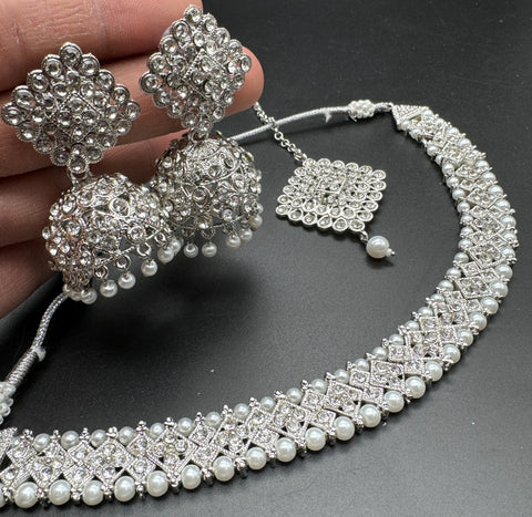Silver color Beautiful jerkan stone with pearls beaded necklace with jhumka and tikka set