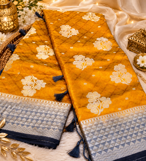 Premium two shaded Silk Saree with rich zari weaving and contrast woven pallu. featuring elegant dual-tone shades.Model-worn blouse is for reference only. Unstitched blouse piece is attached with saree(slight variation in color & design is possible)