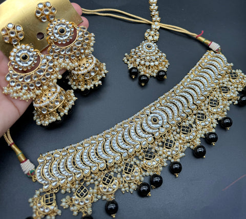 Kundan with pearls work beautiful heavy work choker necklace with designer Jhumka Earrings and Tikka