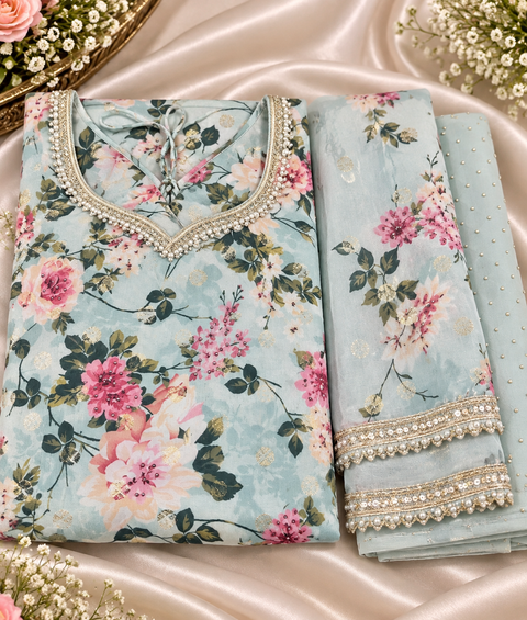 Lite Blue color Floral print tissue-silk style kameez with embroidery & sequin work, georgette plazo and sequined work net dupatta. Slight variation in colour/design possible.