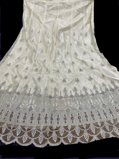 Netting based silver stones and embroidery work all over front & back of kameez with stone work and beautiful lehnga & netting dupatta (Size 44 and can be altered upto 46)