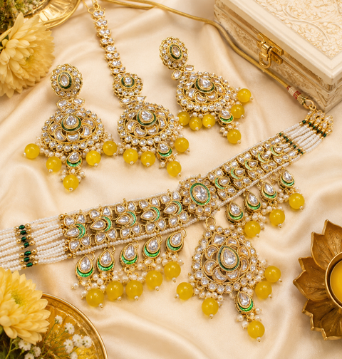 Beautiful Kundan and pearls work classy choker set with beautiful earrings & Tikka