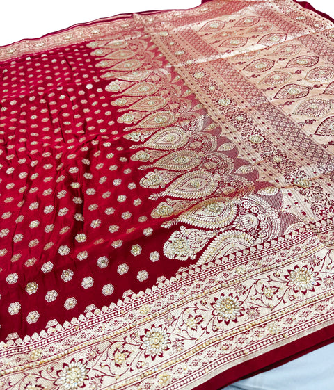 Deep Maroon color Beautifully Designed Banarasi Silk Saree With Heavy Handwork With Stones & Zari