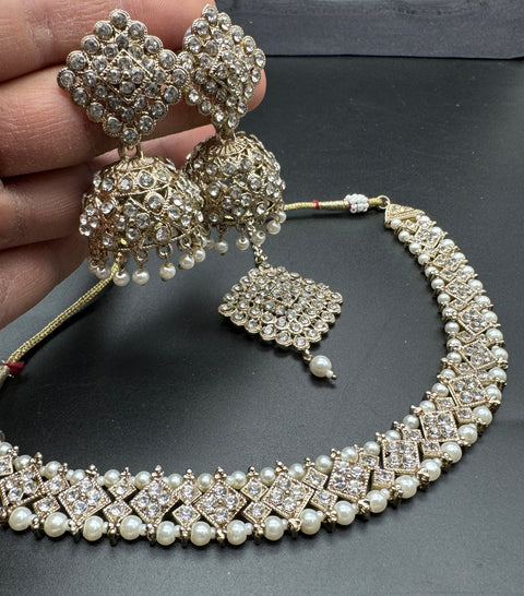 Lite Golden color Beautiful jerkan stone with pearls beaded necklace with jhumka and tikka set
