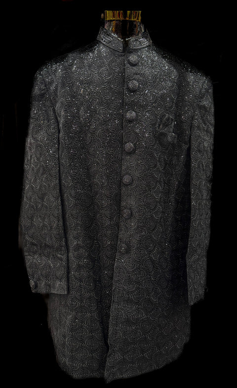 (Video clip attached )Black color based heavy embroidery & sequined work all over with hand work pearl beaded neck, buttons and sleeves design Sherwani and black Pants
