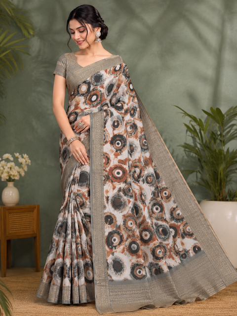 Elegant soft art silk saree featuring a vibrant abstract digital print, complemented with a rich gold zari woven border , Comes With An Unstitched Running Blouse Piece Attached To The Saree (Slight Variation In Color And Design Is Possible)