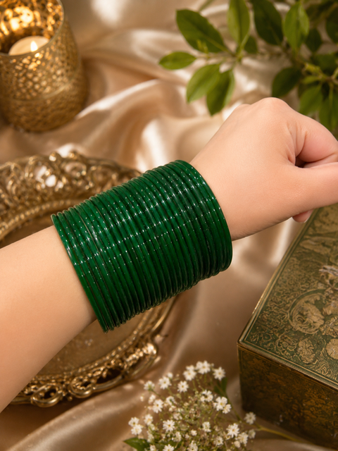Dark Green color plain glass bangles. Each set includes 2 dozen bangles. Price is per set. Slight colour variation may occur
