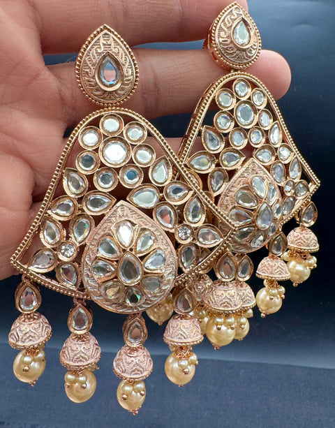(video clip attached)Lite Golden base Original Kundan Polki stones with Meenkari & Pearls work Bridal necklace with beautiful Jhumka, tikka , 2 Rings NOTE:- original Kundan Polki stones not fake plastic stones)