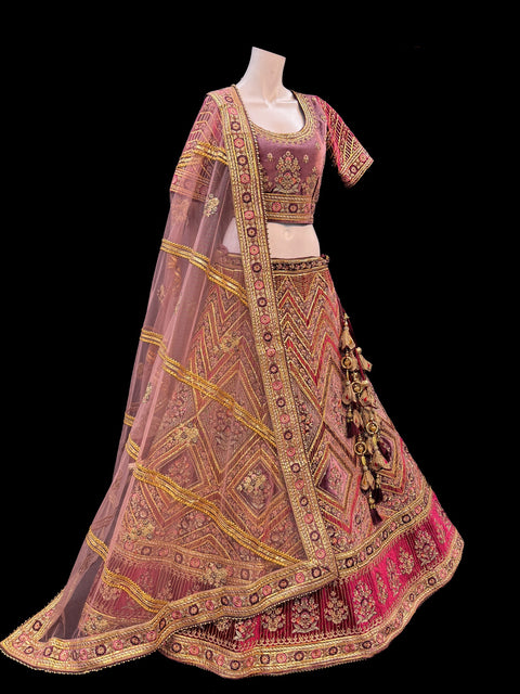 (Video clip attached)size42(upto 46)Pastel Purple mauve shade velvet based heavy embroidery & gotta patti work with golden stone & maroon with pink Mint colour flower design very heavy super big flared heavy ken designer Bridal Lehnga with bigger tessels