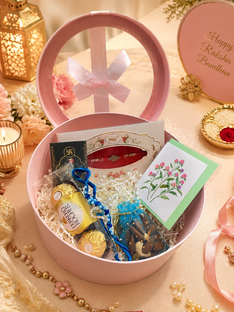 Customisable Rakhi Gift Box – Create a thoughtful Raksha Bandhan surprise with our beautifully curated custom gift box. It includes a Rakhi, Rakhi thread, premium chocolates, dry fruits, a tilak pack & a heartfelt greeting card for your personal message