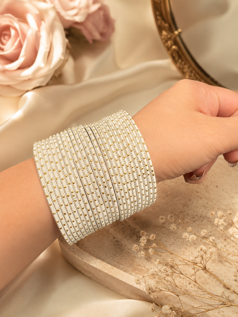 Golden Shimmer dotted metal bangles 2 dozen in 1 Set (slight variation in color & design may occur)