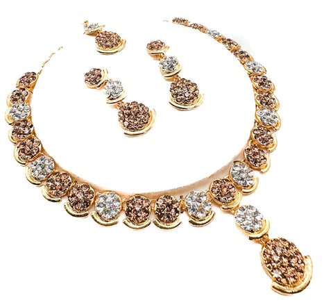 Golden color Jerkan stone studded beautiful necklace set with Earrings & Tikka