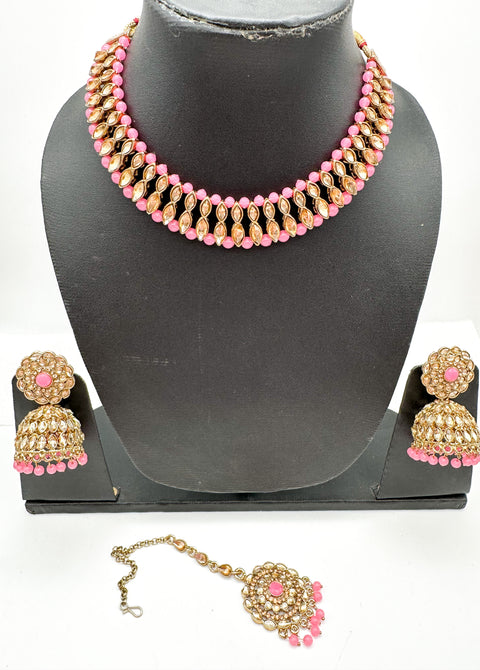 Golden stone with pearls studded simple Necklace with beautiful Jhumka & Tikka set