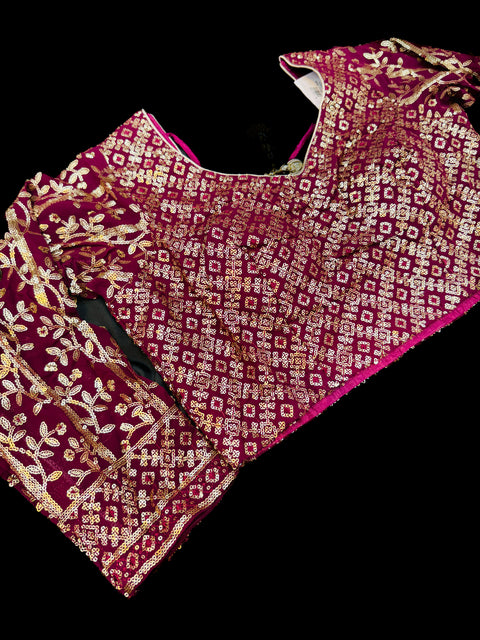 All over embroidery with sequined work heavy design crop top blouse with heavy work multiflared lehnga and netting dupatta