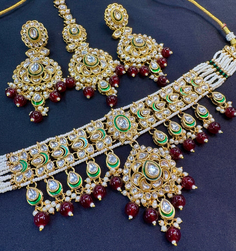 Beautiful Kundan and pearls work classy choker set with beautiful earrings & Tikka