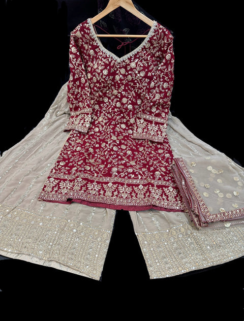 Georgette based sequined and embroidery work kameez with sharara pants and netting dupatta