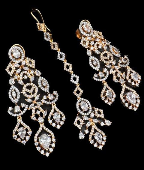 (video clip attached )Golden color Beautiful and elegant look Bridal/Semi Bridal American diamonds studded Heavy work necklace with beautiful earrings Note :- original AD stones  not fake plastic stones )