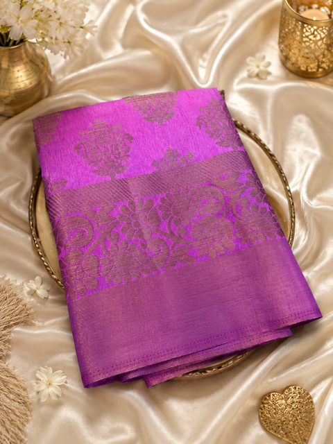Graceful Cotton Silk Saree featuring elegant zari weaving, a rich texture, and a structured drape . Attached Blouse Piece Included. Slight Variation In Colour And Design May Occur.