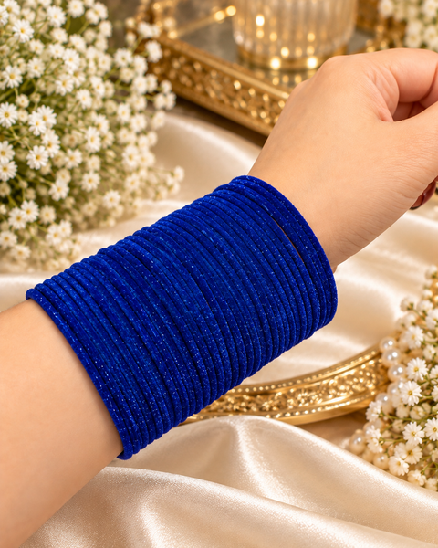 Elegant velvet bangles in a rich Royal Blue shade, perfect for festive, bridal and traditional looks. Each pack includes 3 dozen bangles (36 pieces). Price is per pack. Slight variation in colour may be possible