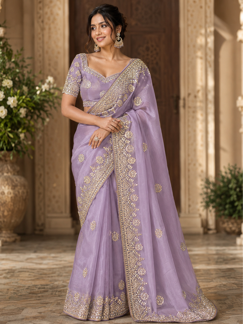 Lavender color Pure and very soft organza tissue based embroidery work jaal all over with stone work & gotta patti beautiful Saree. Model blouse is for reference only; blouse fabric comes with the saree. Slight color and design variations may occur