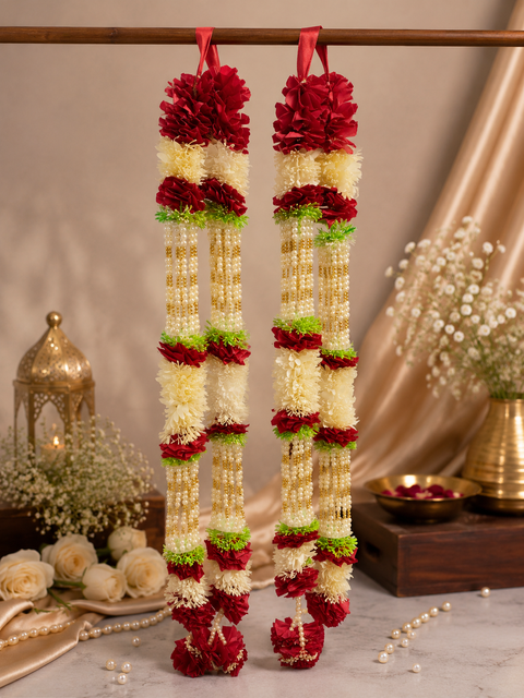 Beautifully crafted flowers and pearls Varmala, featuring elegant floral detailing and rich traditional accents. A perfect choice to add a vibrant and graceful touch to your special wedding ceremony.(comes in one pair)