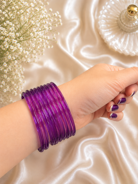 Purple color Ultra-trendy jelly bangles with glossy vibrant shades — the perfect statement stack to elevate your everyday and festive looks (slight variation in color and design is possible) Eight bangles per set (price per set)