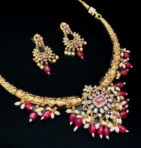 American diamond stones with gold plated look necklace