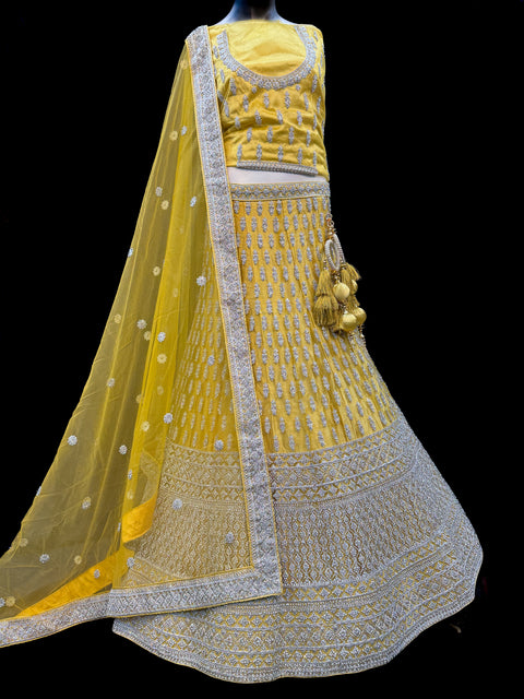 (Video clip attached)SIZE 42 (Upto 46))Lite Mint colour netting Based Beautiful Embroidery Work With Golden Fine Stones& beaded pearl work Very Heavy Layered Designer semi/Bridal Lehnga With Heavy Tessels Attached To Blouse & Lehnga