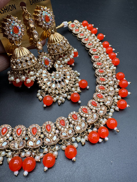 Polki stones & Jerkan stone with pearls beaded work beautiful necklace with earrings and tikka set