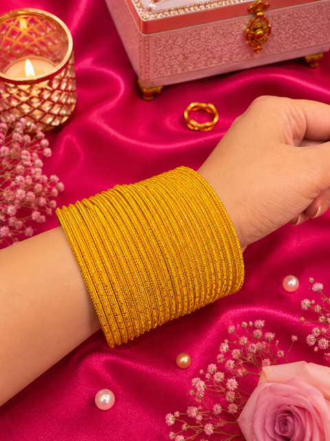 Golden Shimmer dotted metal bangles 2 dozen in 1 Set (slight variation in color & design may occur)