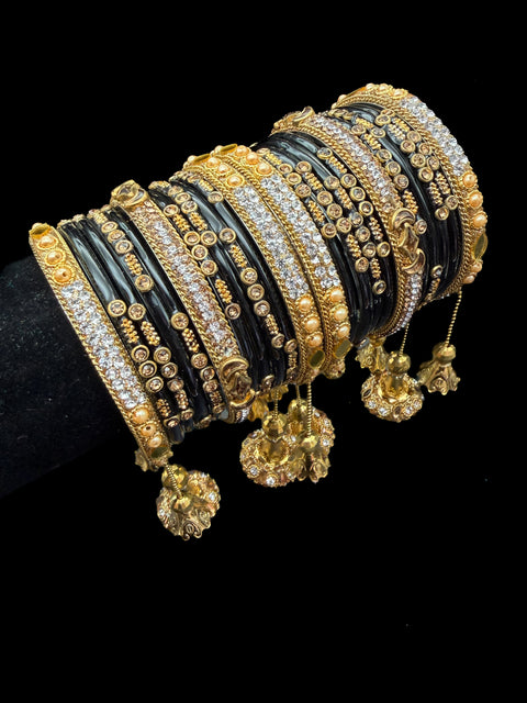 Black & Gold Glass bangles with golden brass bangles set with latkan kade set(displayed picture is for both hands set) price is for whole set displayed in picture)