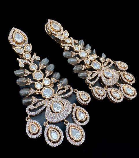 Golden American Diamond stones very classy and beautiful earrings