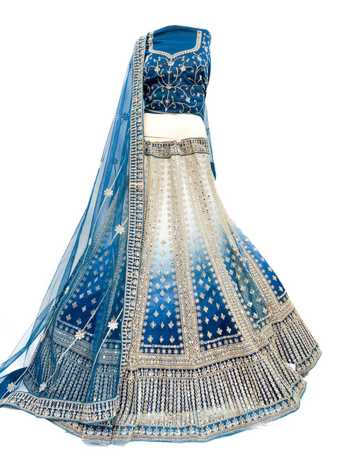 Original mirrors work Heavy Ken ken flared two toned shades netting based designer lehnga with heavy handwork blouse and Dupatta (video clip attached for reference )
