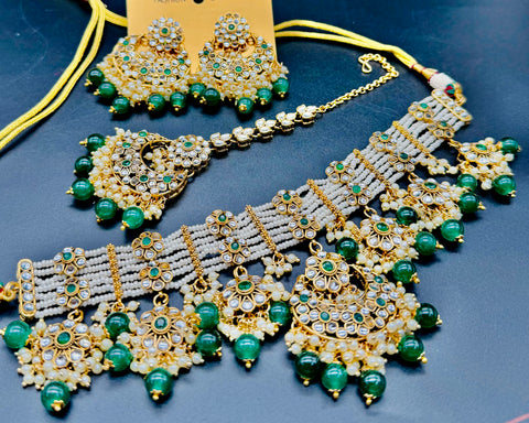 Kundan with pearls work beautiful heavy work necklace with designer Jhumka Earrings and Tikka