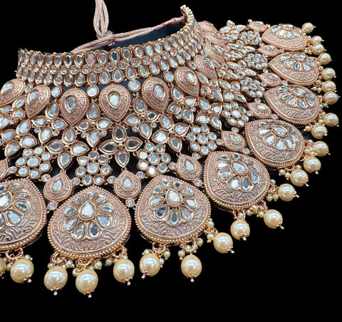 (video clip attached)Lite Golden base Original Kundan Polki stones with Meenkari & Pearls work Bridal necklace with beautiful Jhumka, tikka , 2 Rings NOTE:- original Kundan Polki stones not fake plastic stones)