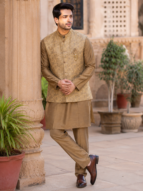 Elegant jacquard waistcoat set with a matching kurta and straight pants, crafted for a refined festive and wedding look.