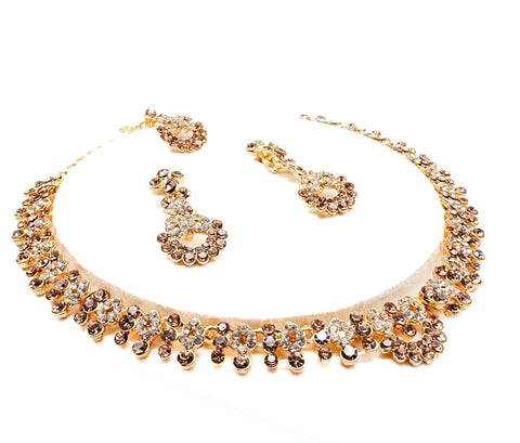 Golden color Jerkan stone studded beautiful necklace set with Earrings & Tikka