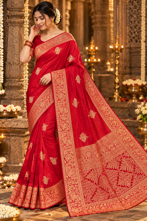 Luxuriously soft silk saree with a smooth, lightweight feel and beautifully flowy drape. Featuring rich woven zari floral motifs and an elegant detailed border .Blouse piece included. Slight variation in colour and design is possible.