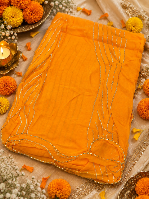 Elegant chiffon dupatta with delicate gold stripe detailing. Lightweight, flowy and perfect for festive or party wear.slight variation in color & design is possible