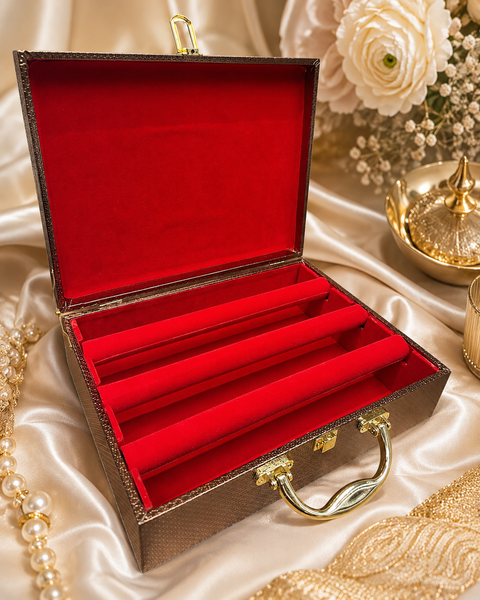 Beautiful mirror-work bangle box with a rich red interior and 3 spacious rows. Bangles are not included and are shown for display only. Fill it with your own bangles or shop our beautiful bangle collection online.
Approx. Size: 34 × 25 × 9.5 cm.