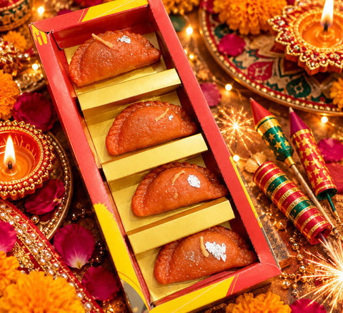 Gujiya -Inspired Candle Set with silver foil-style detailing, perfect for Diwali décor, pooja and gifting. Slight variation in shape or finish may occur.