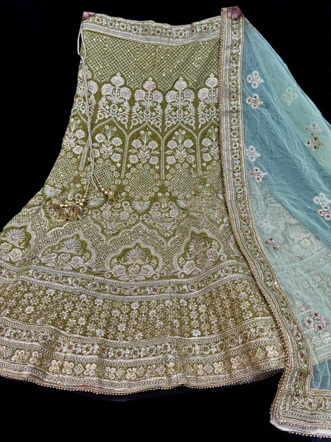 (Video clip attached) Size 40(altered upto 44)Olive colour velvet based heavy flared embroidery & stone work bridal Lehnga with heavy work Mint dupatta