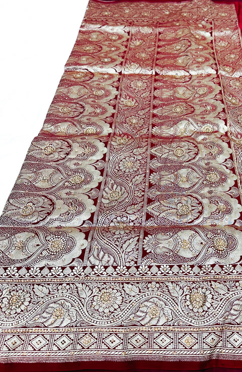Beautifully designed Banarasi Silk Saree with heavy Handwork with stones & Zari