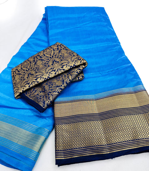 Soft Silk based Broad zari border Saree with Contrast Brocade silk based Blouse