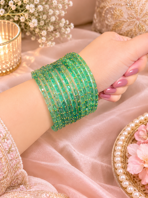 Emerald Mint Green Elegant Kashmiri bangles featuring a premium handcrafted design with sparkling stone and gold detailing(slight variation in color and design is possible) one dozen bangles per set (price per set)