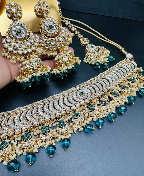 Kundan with pearls work beautiful heavy work choker necklace with designer Jhumka Earrings and Tikka