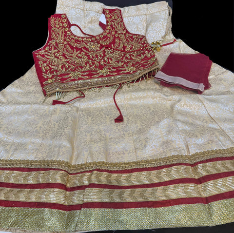 Maroon Colour silk Based Blouse With Embroidery & Stone Work With Golden Brocade Silk Lehnga & Netting Dupatta