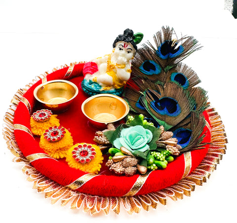 Beautiful Krishna Murti decorated in plate with peacock feather and Jyoti stand attached