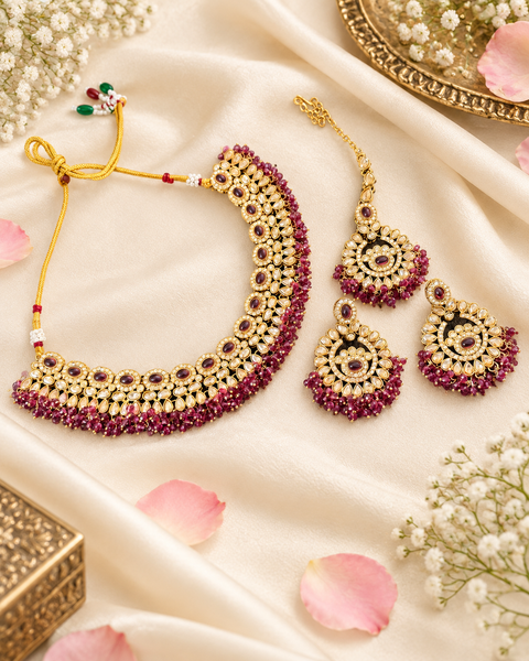 Beautifully crafted with sparkling golden stones, Polki-look stones, and colourful beads. Slight variations in colour and design are possible.